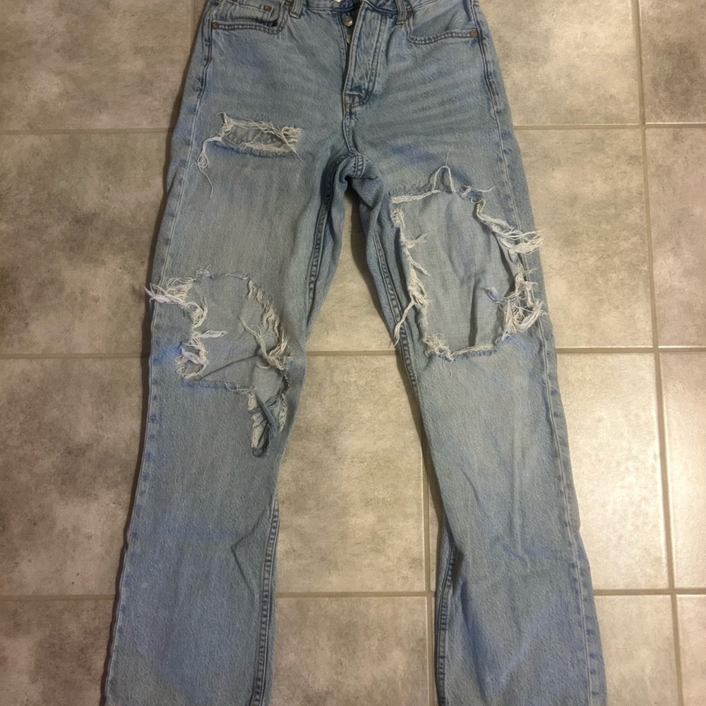 Distressed Light Blue Jeans